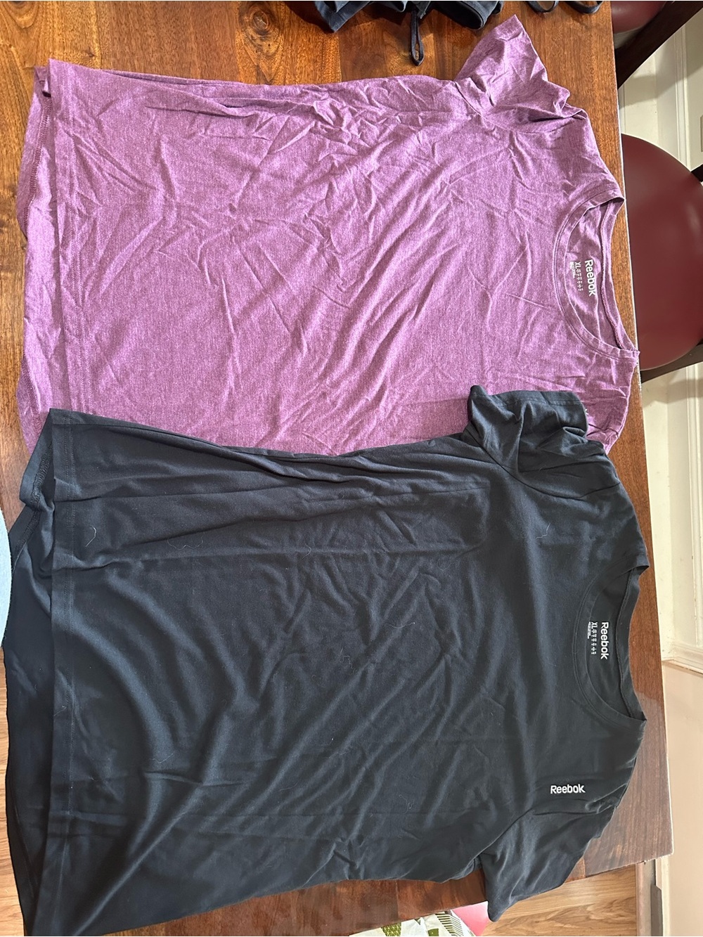 2 Reebok workout shirts XL